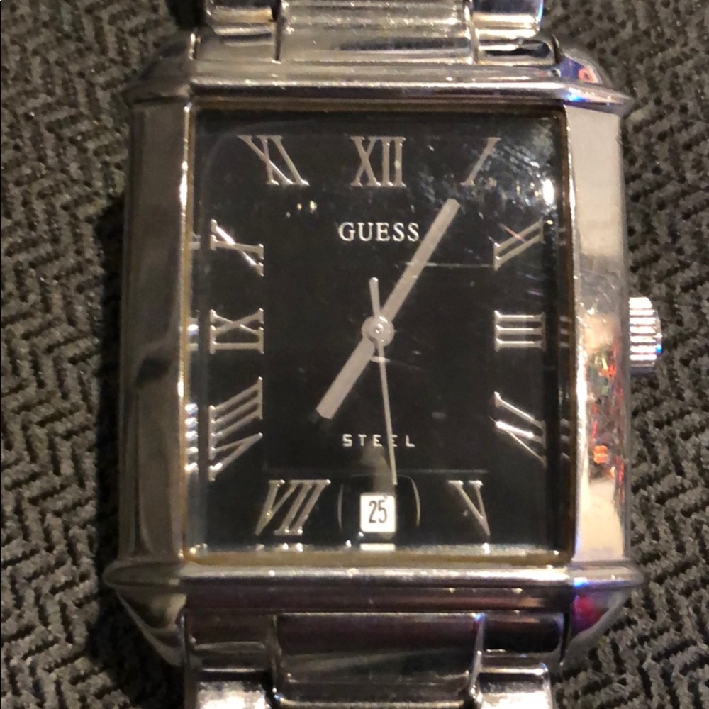 Men’s Guess watch.